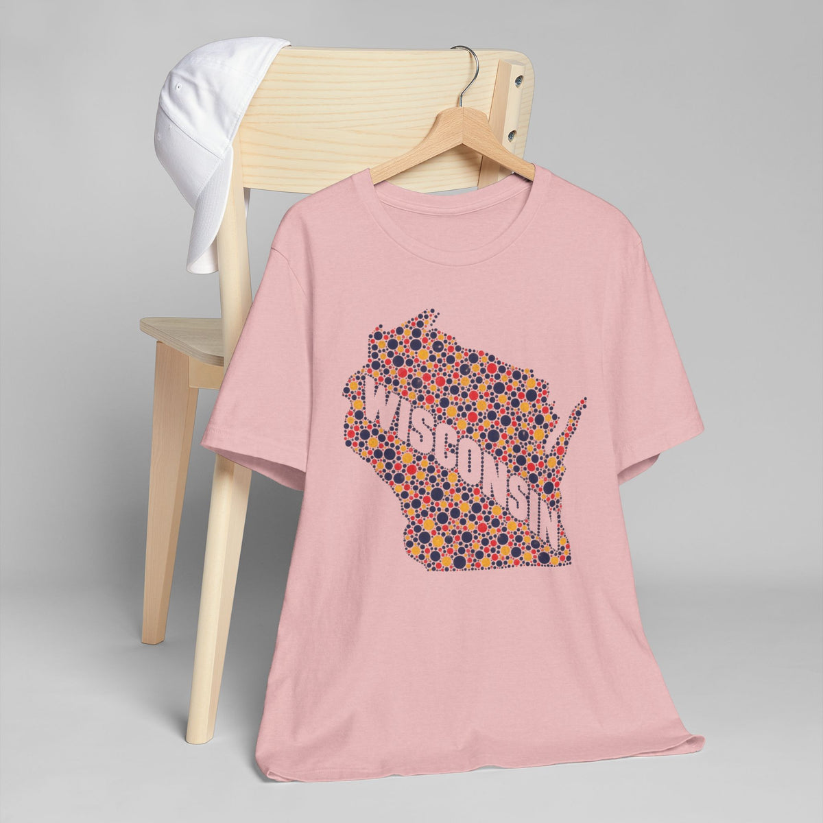 Pink crewneck T-shirt with colorful Wisconsin floral map dot graphic on front