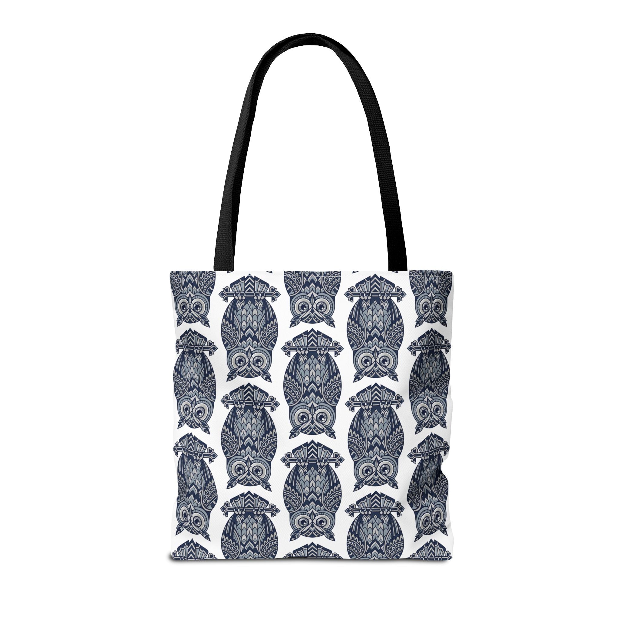 Cotton tote bag with repeating blue owl illustration pattern and black carrying handles.