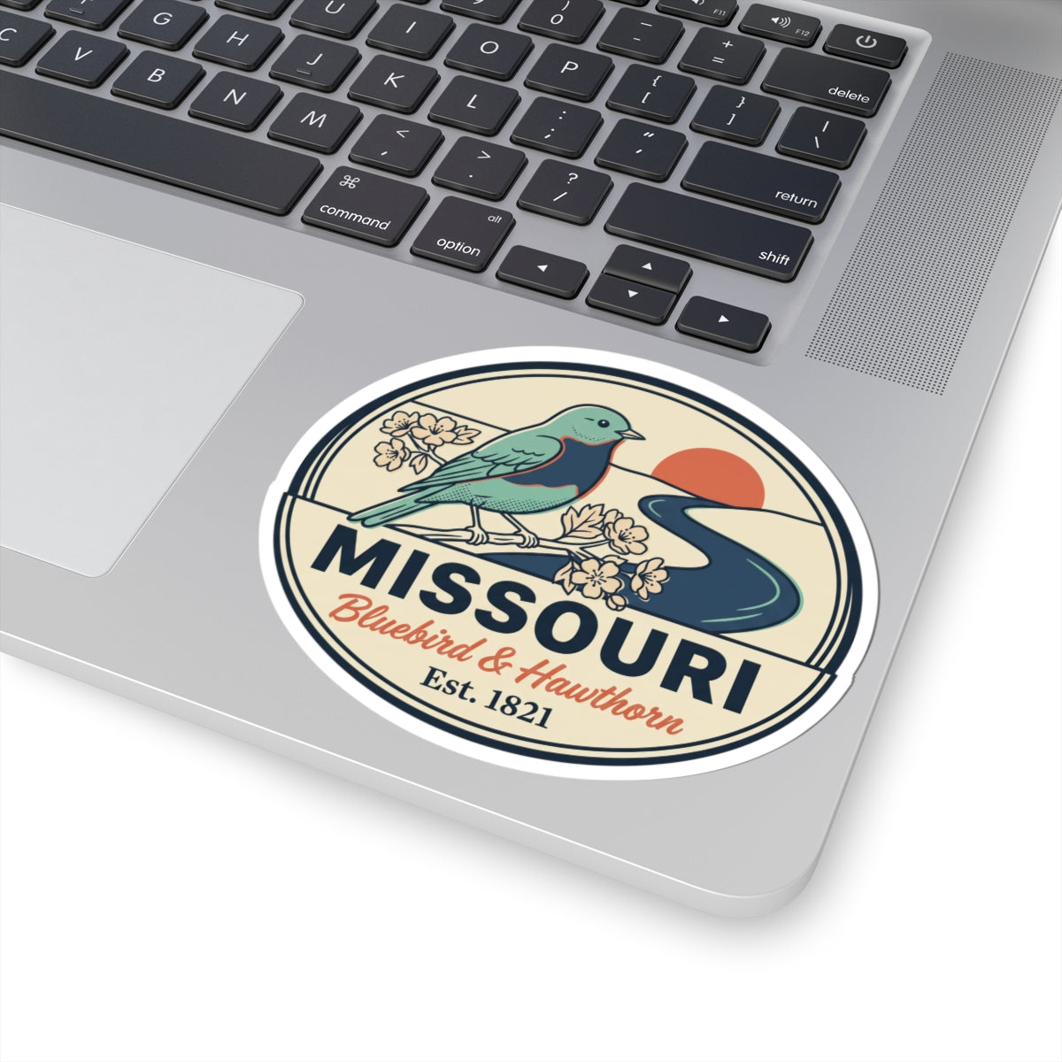 Round Missouri sticker with bluebird illustration, floral branch, and vintage border design