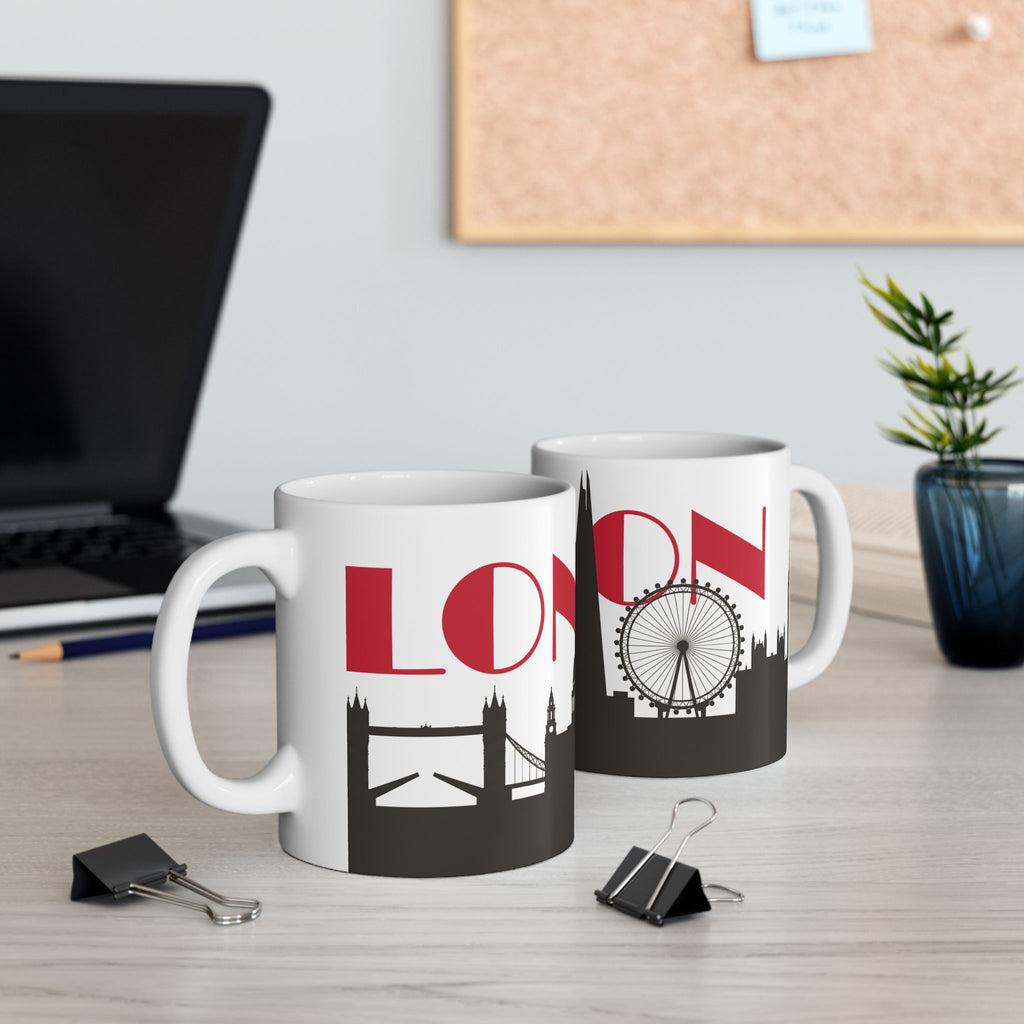 Pair of white coffee mugs with red lettering and black London skyline artwork
