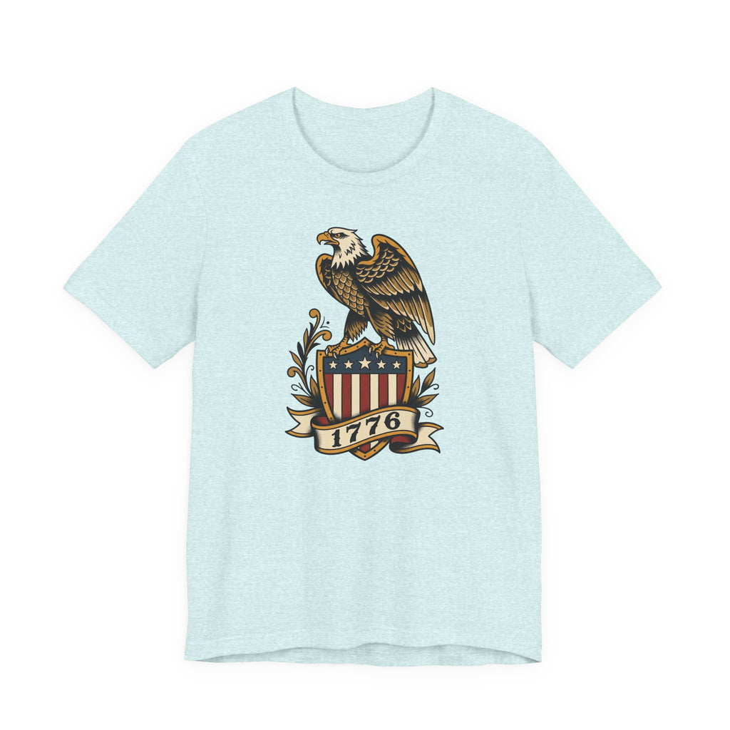 Light blue t-shirt with eagle shield graphic and banner reading 1776