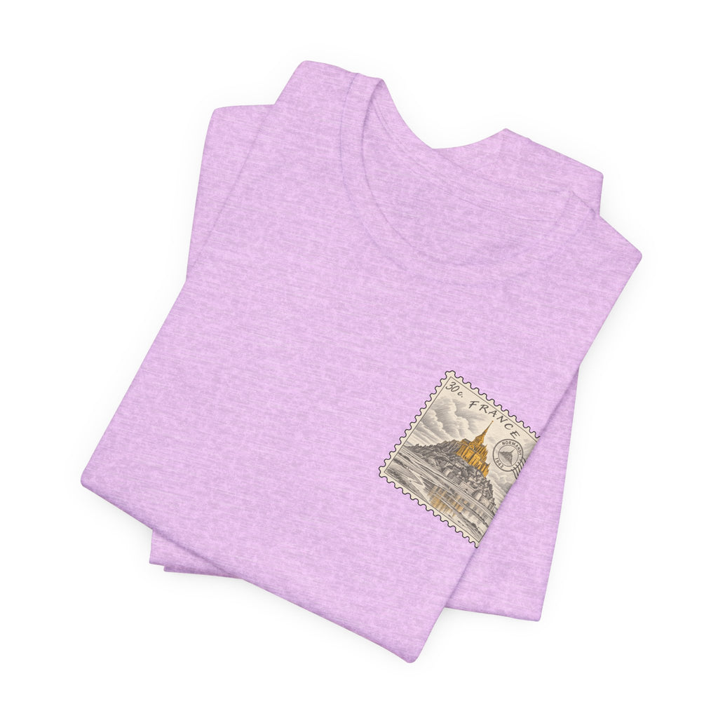 Lilac heather short-sleeve t-shirt stack with small vintage postage stamp graphic on chest.