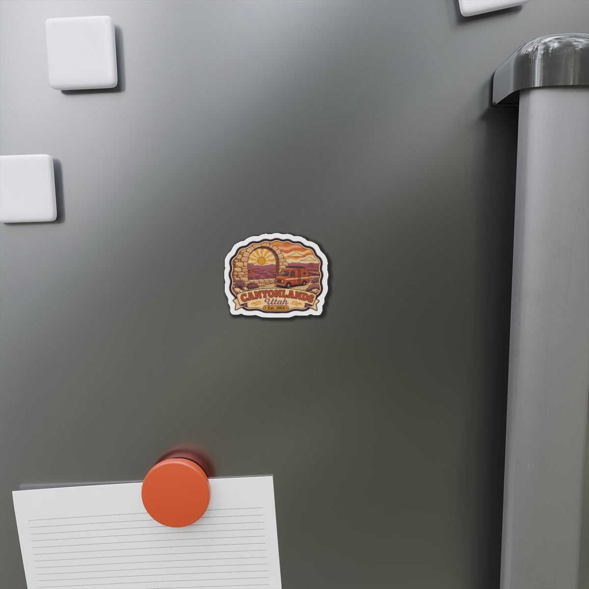 Die-cut Canyonlands Utah fridge magnet on a stainless refrigerator door with camper van design
