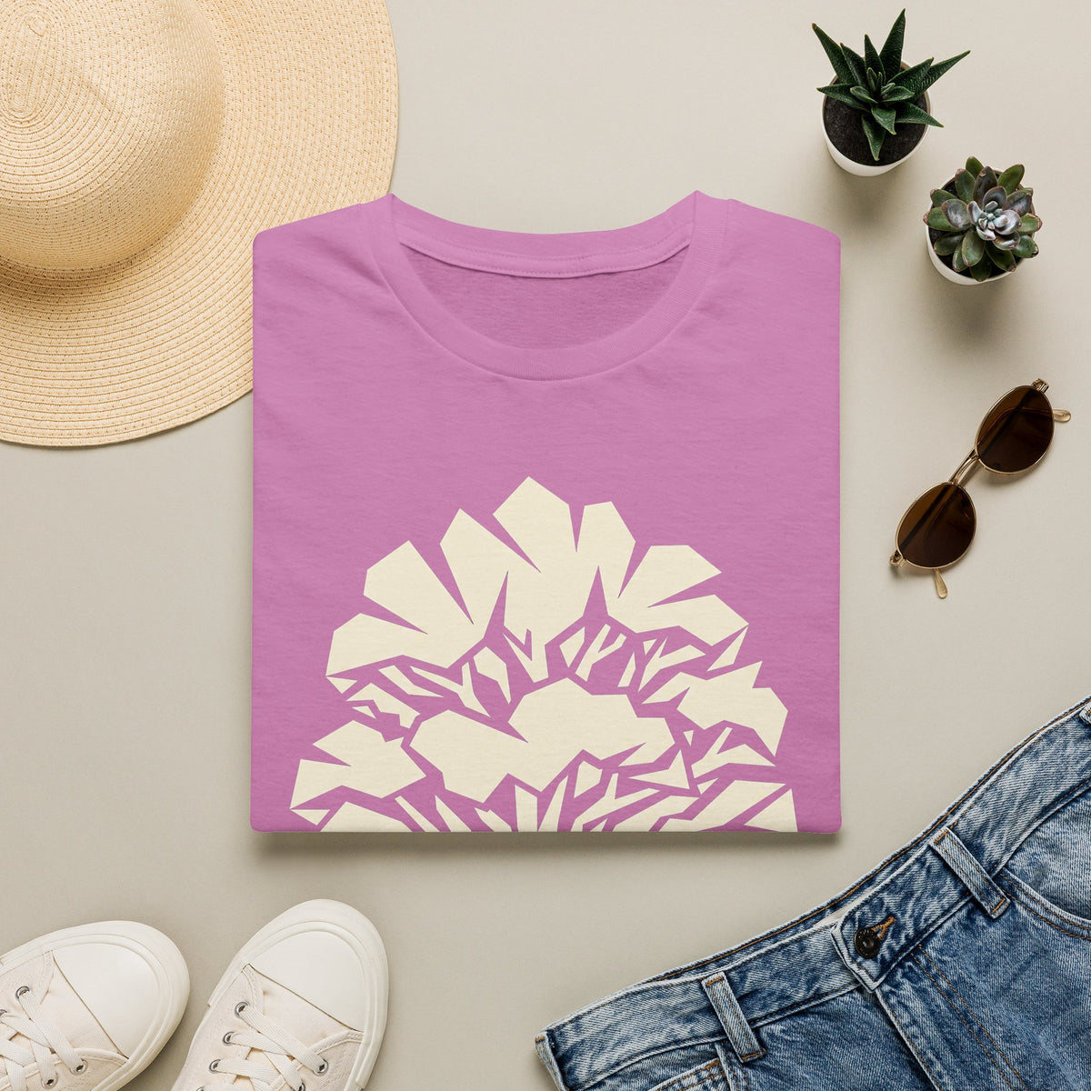 Purple t-shirt with geometric faceted tree silhouette graphic on front.