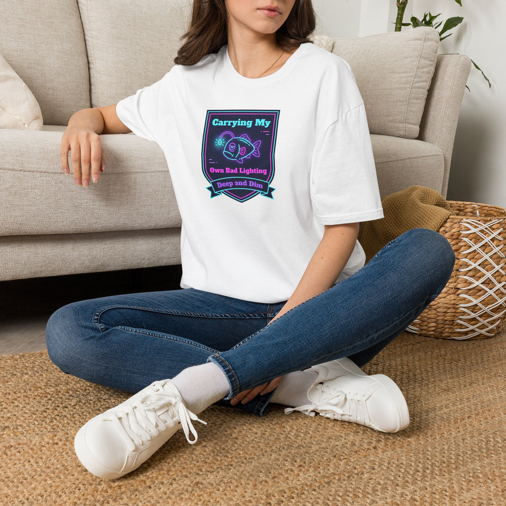 White T-shirt with neon anglerfish graphic and ribbon text, worn on model
