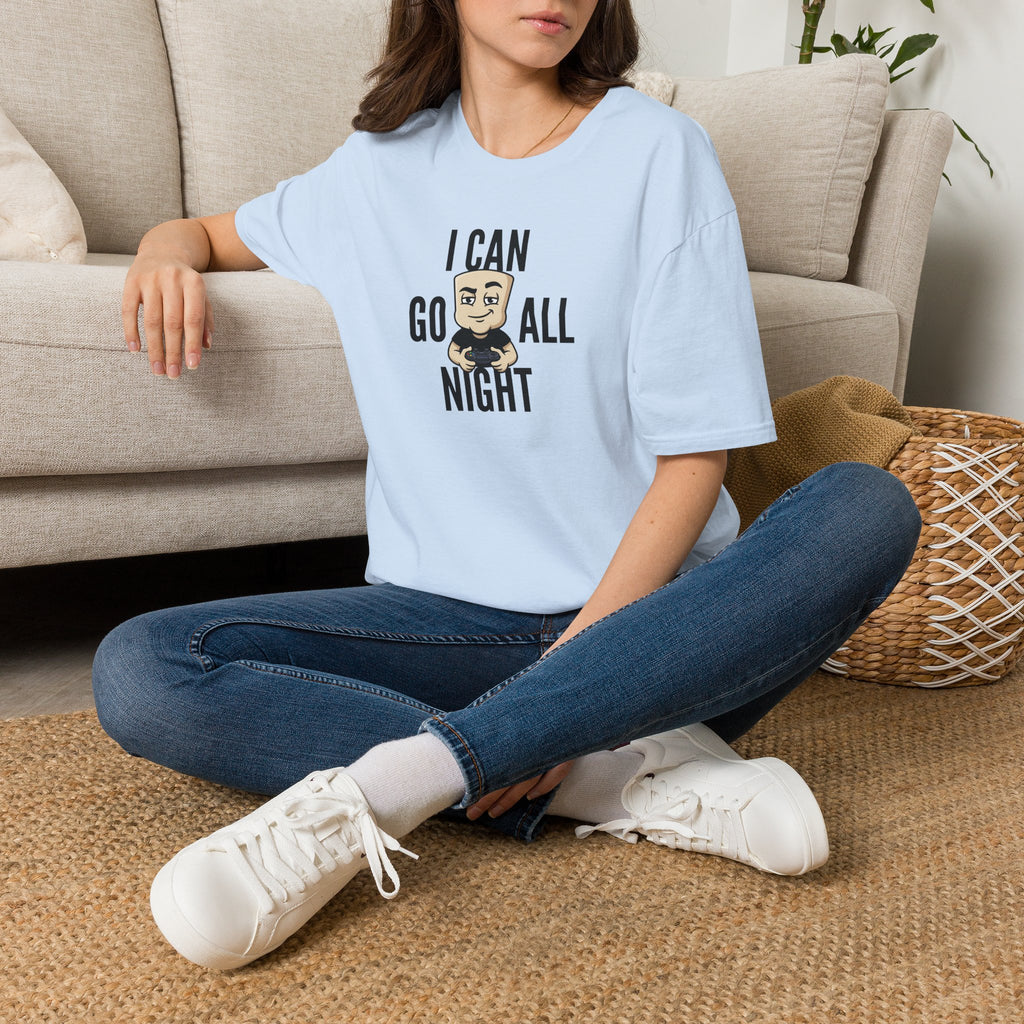 Light blue T-shirt with front gamer graphic, worn by seated person