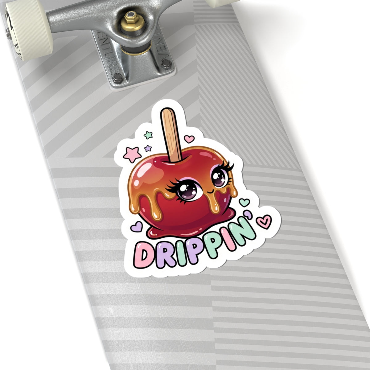 Kiss-cut sticker of a red candy apple character with "DRIPPIN'" on a notebook page