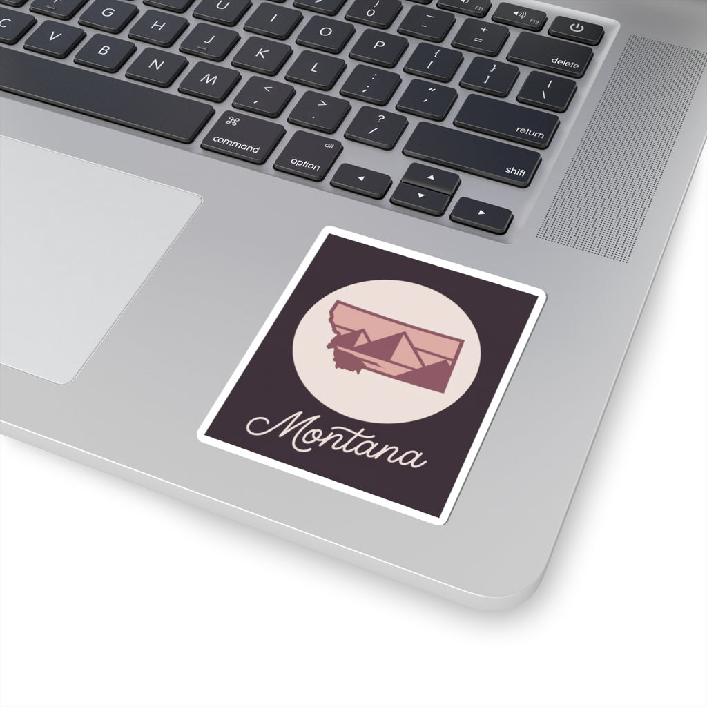 Montana decal sticker on laptop keyboard: circular mountain graphic and “Montana” text