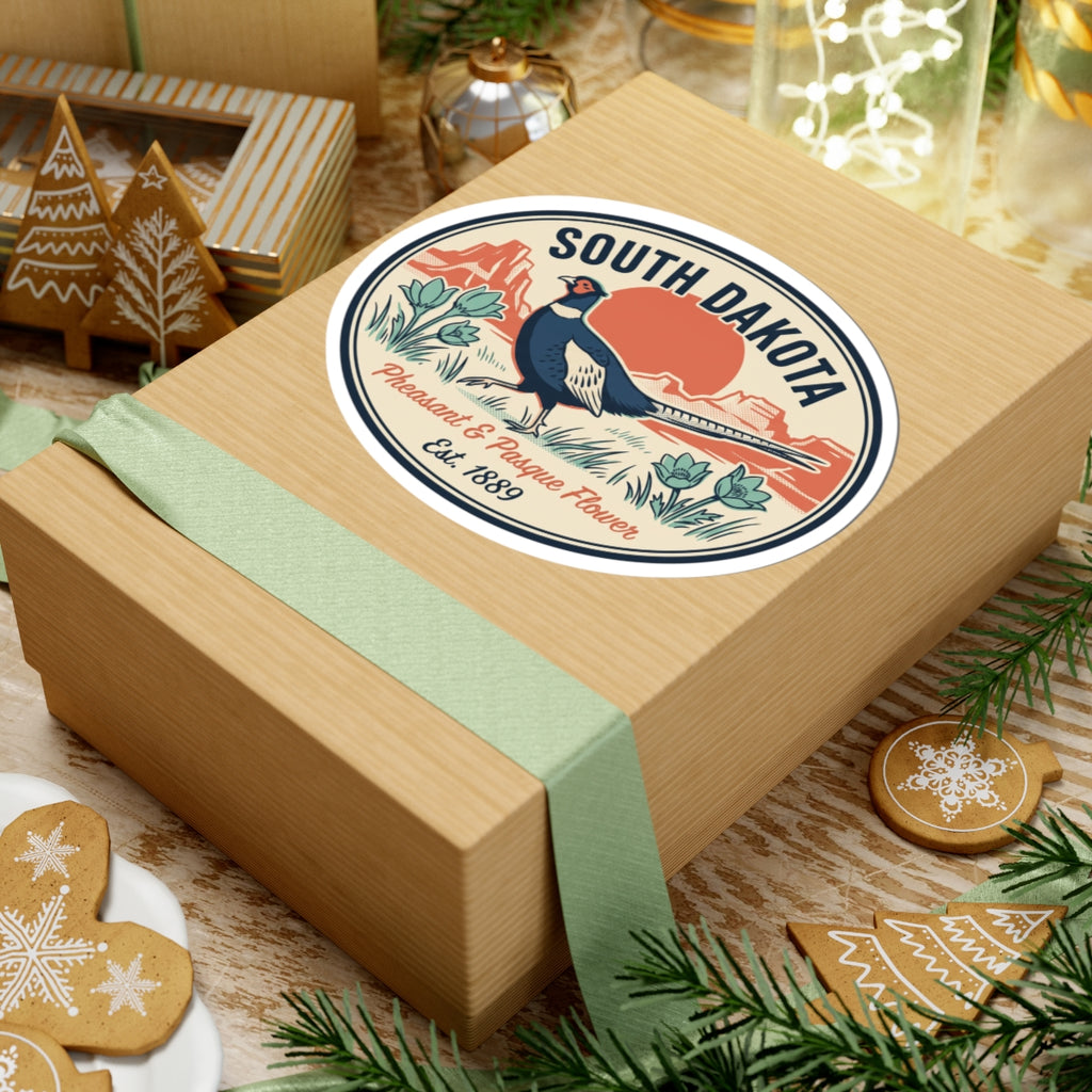 South Dakota vintage badge sticker on a wooden gift box, pheasant and pasque flowers