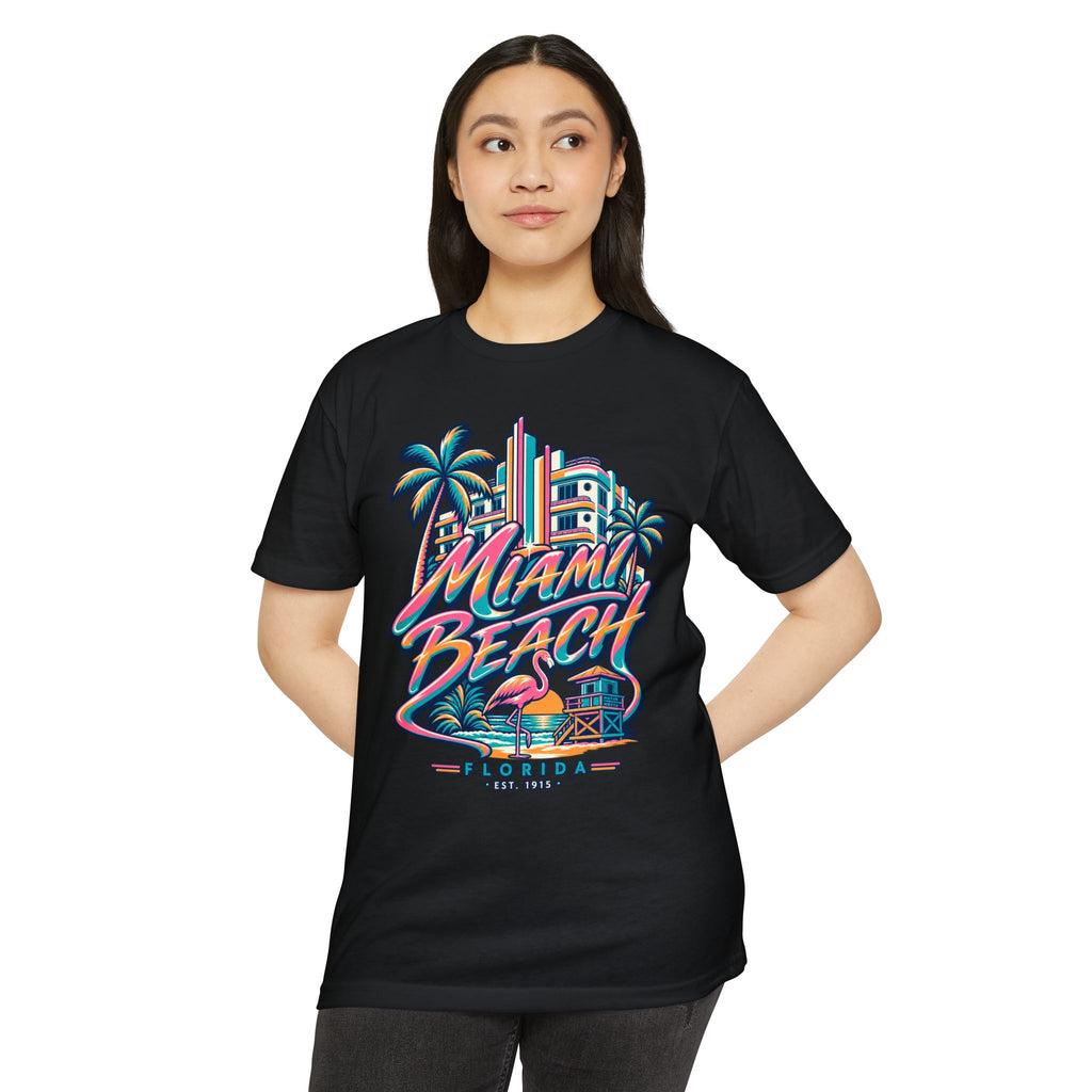 Black T-shirt worn by model with colorful Miami Beach Florida graphic, palm trees, and tower.
