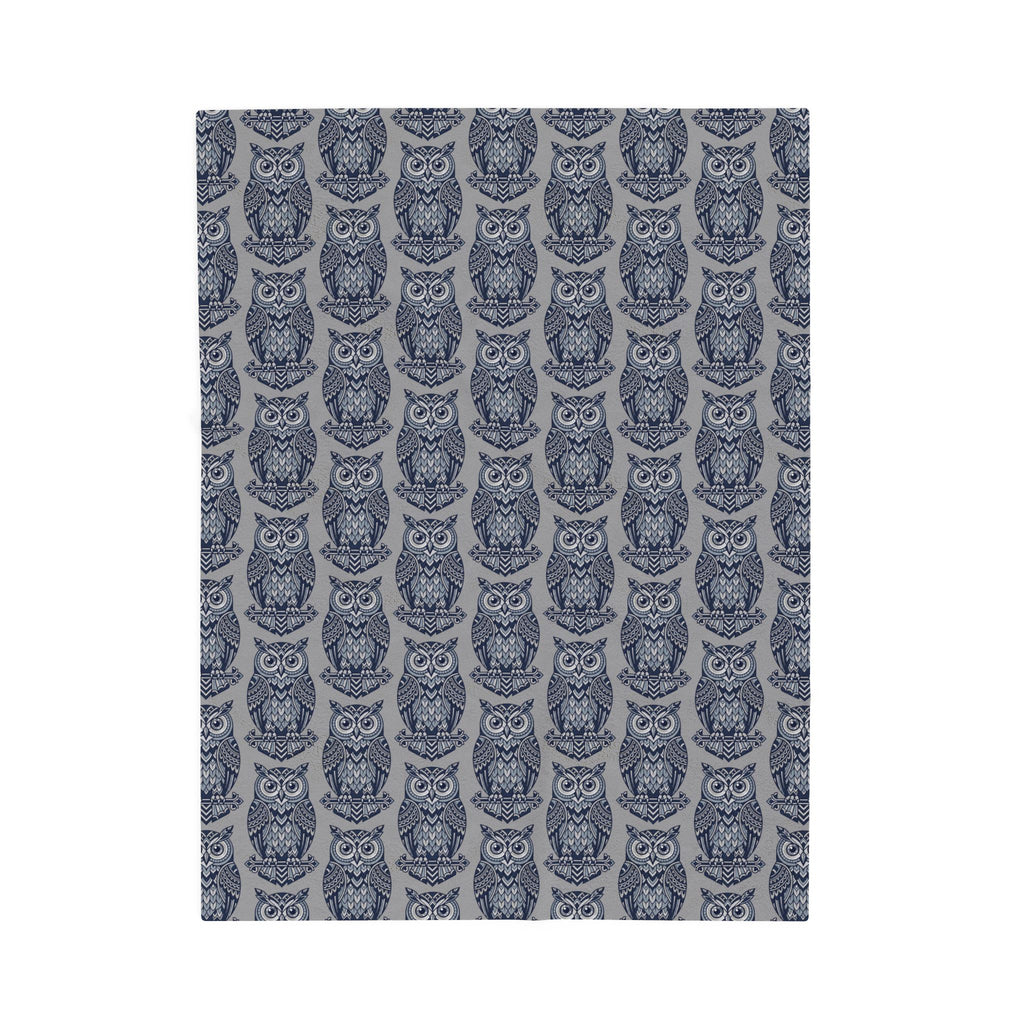 Blue repeating owl pattern plush blanket panel, centered close-up