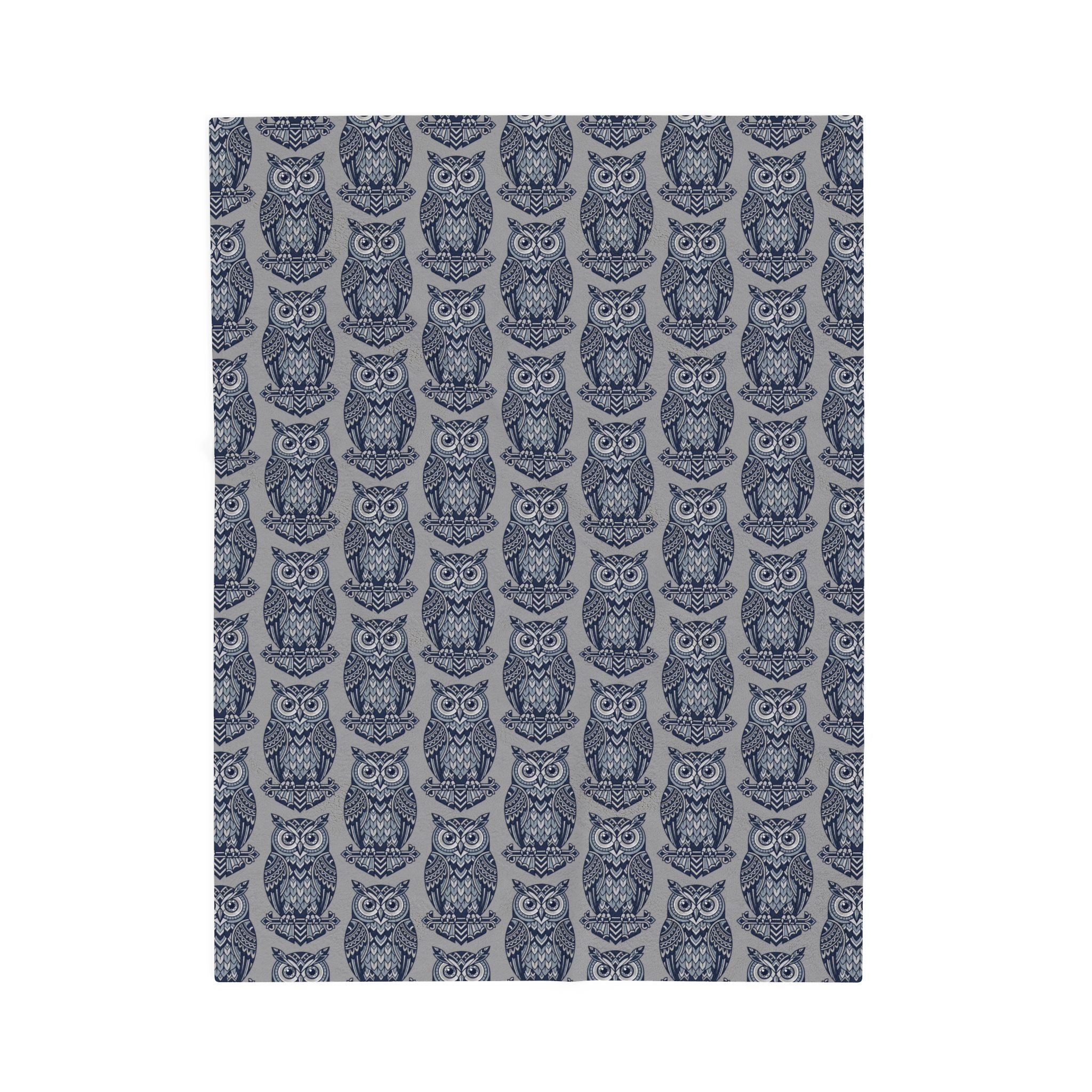 Blue repeating owl pattern plush blanket panel, centered close-up