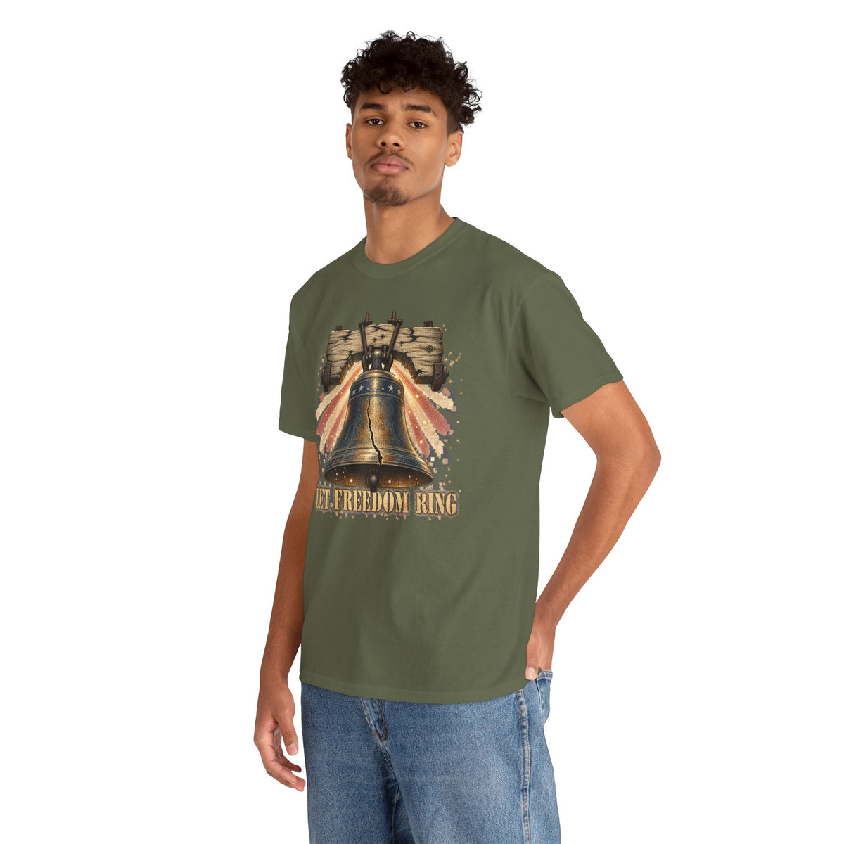 Military green short-sleeve crewneck T-shirt with patriotic liberty bell graphic on model.