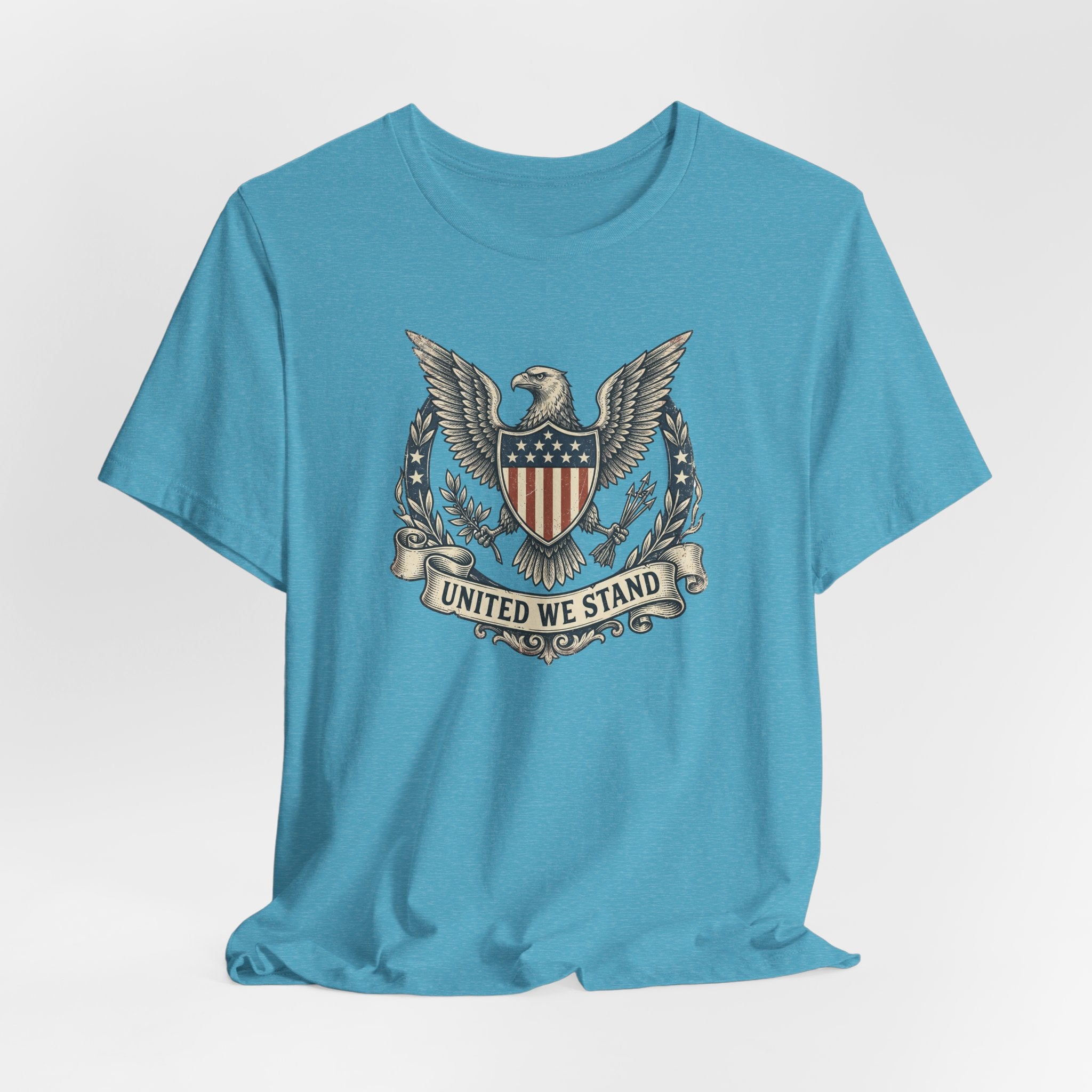 Light blue crew-neck T-shirt with centered eagle shield "United We Stand" print