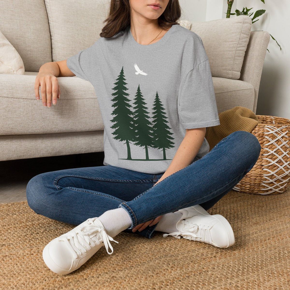 Light gray pine tree and white bird graphic T-shirt on model, crew neck