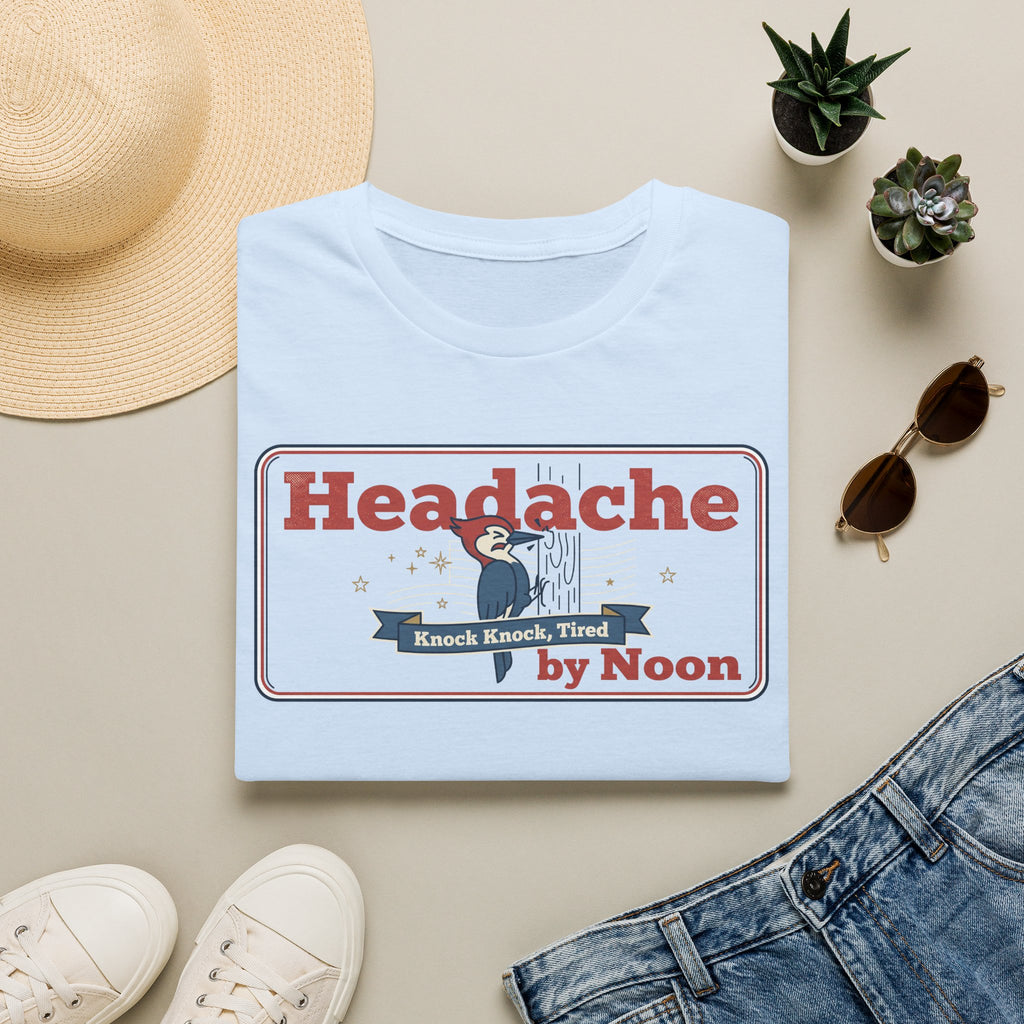 Light blue T-shirt with “Headache” graphic and banner text in red and blue