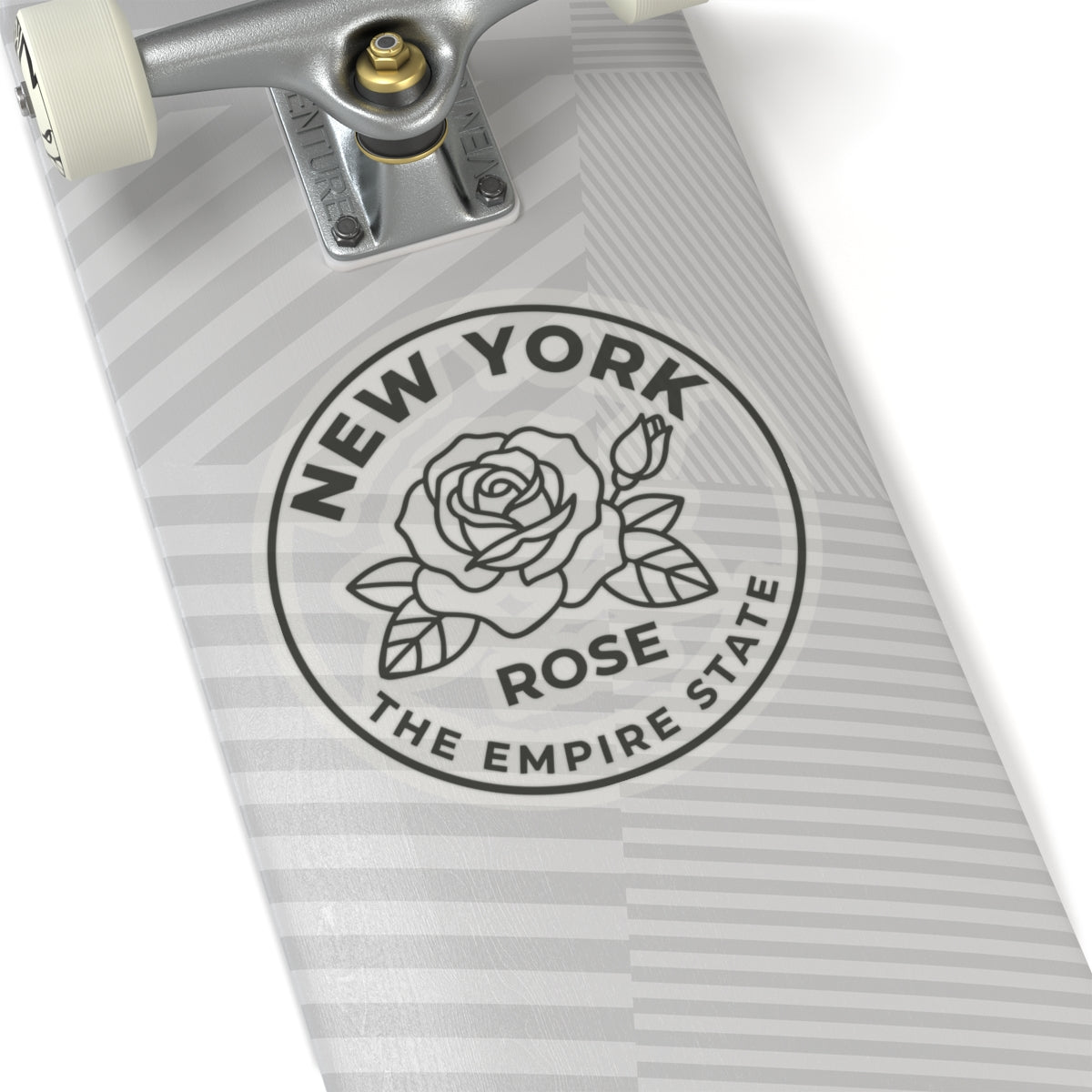Circular rose state sticker on skateboard deck with gray “NEW YORK” and rose icon