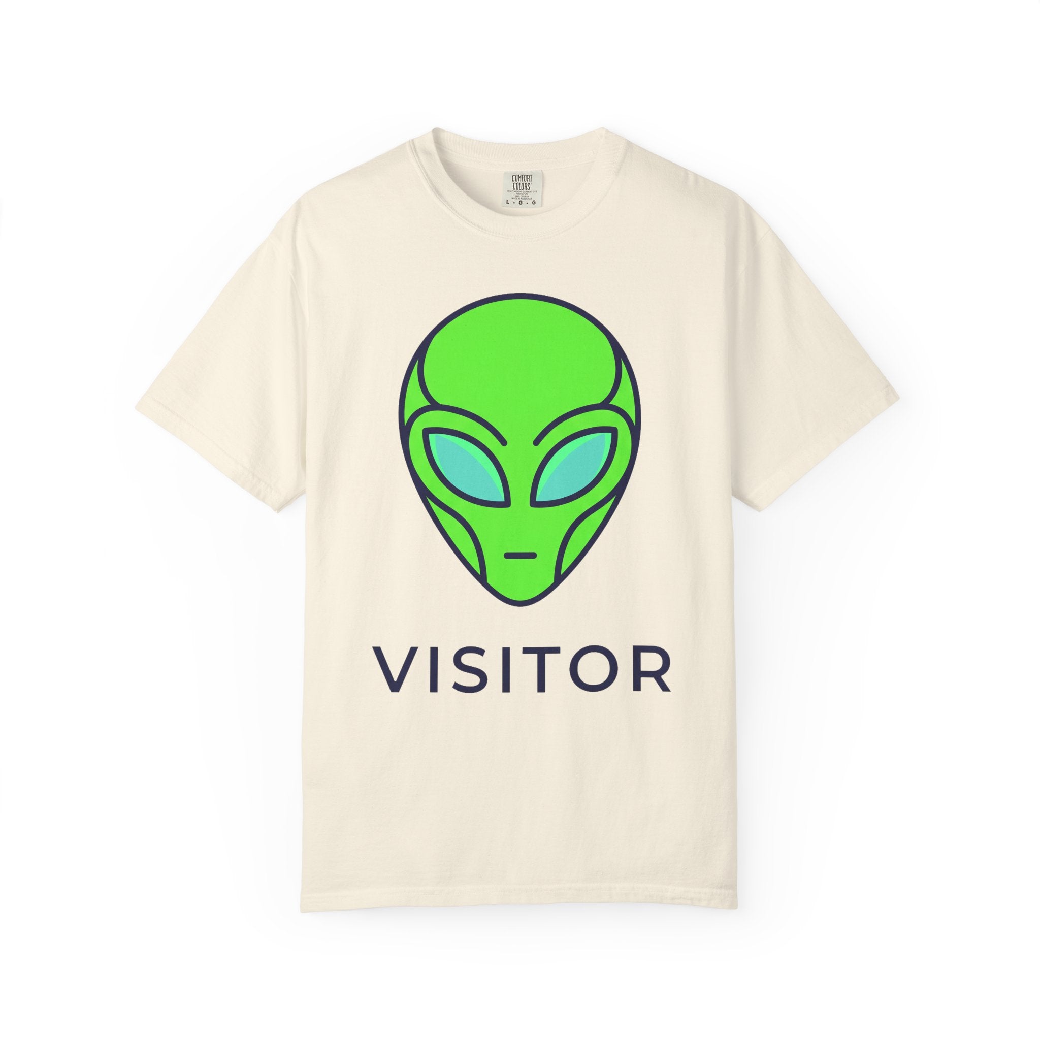 Ivory T-shirt with neon green alien head graphic and word VISITOR