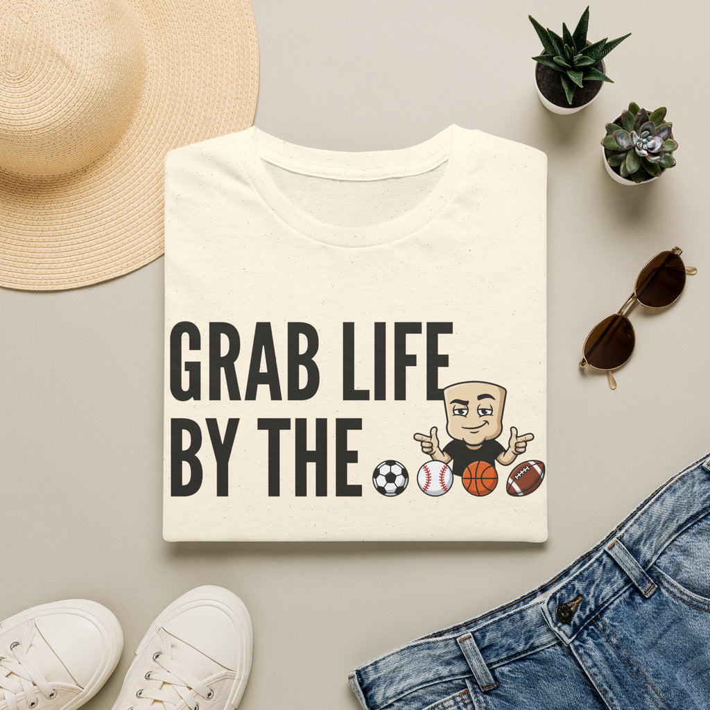 White T-shirt with “GRAB LIFE BY THE” sports ball graphic and raised-arm coach