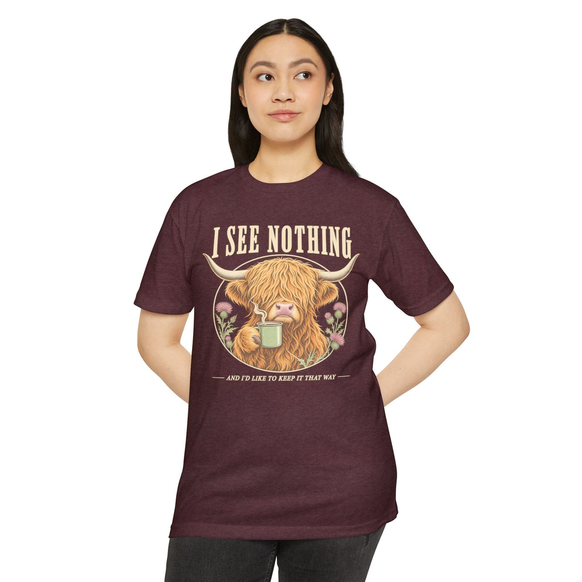 Maroon crew-neck T-shirt with Highland cow graphic and "I See Nothing" text