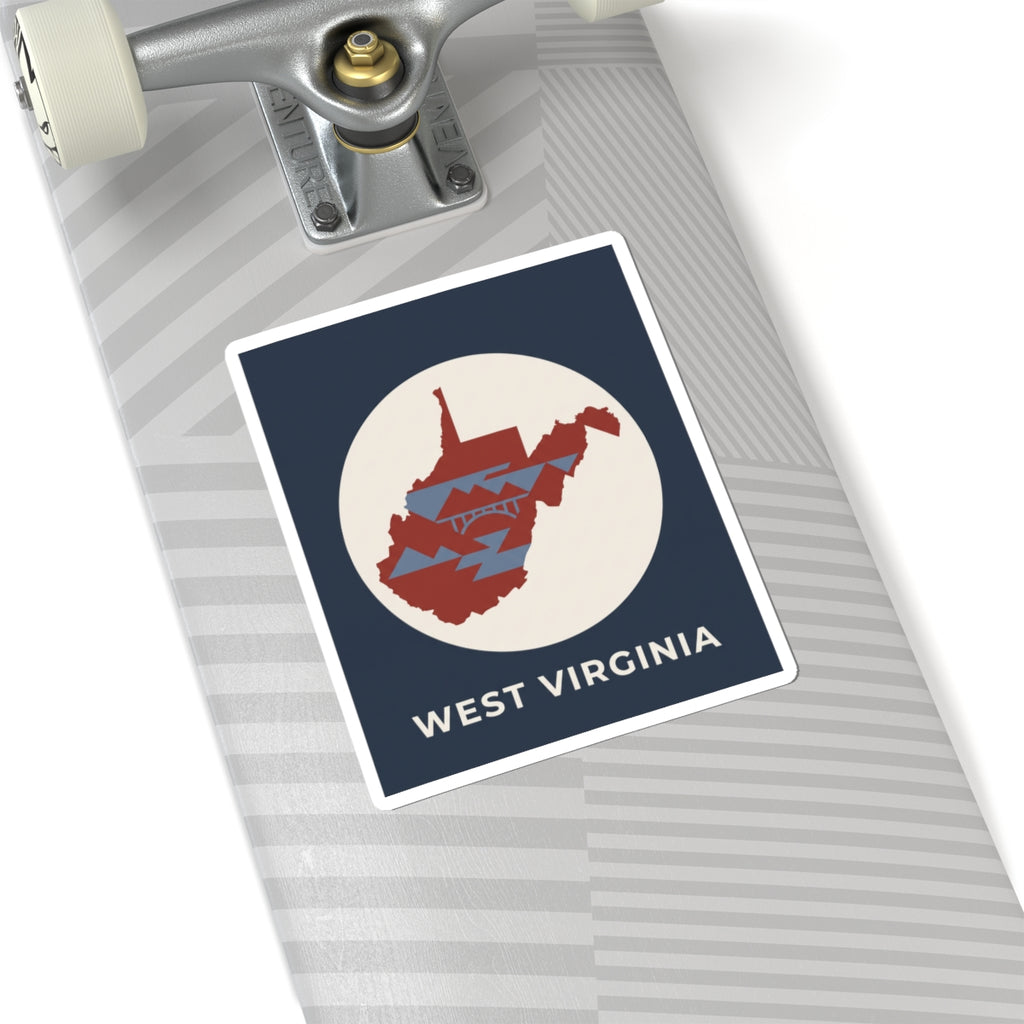 West Virginia map sticker on device surface, navy square with red state graphic and text