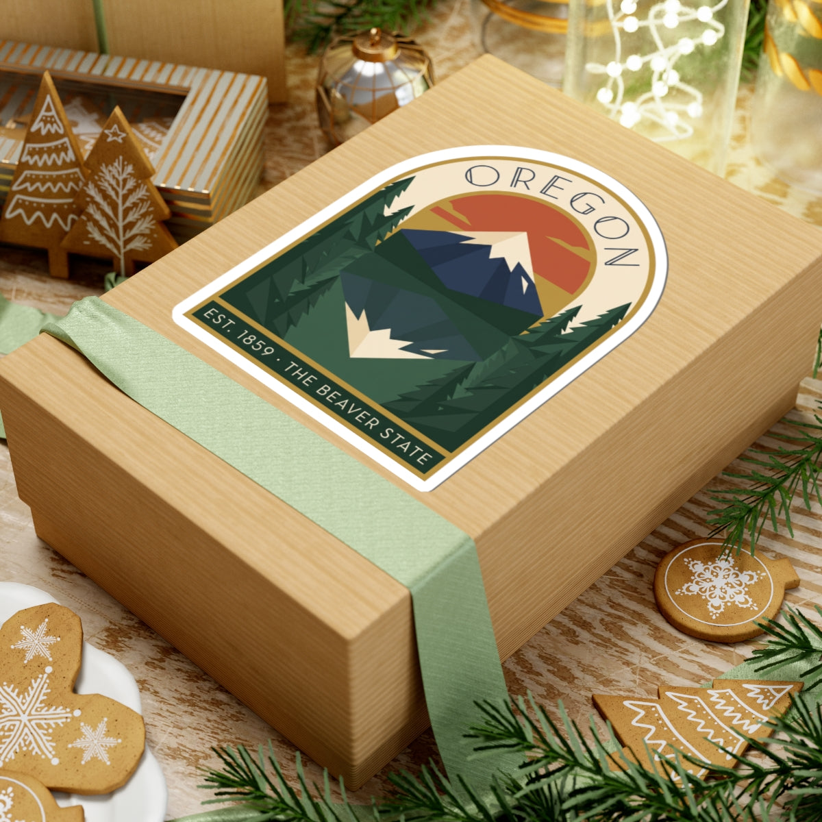 Oregon sticker with arched border, geometric mountains, trees, and “OREGON” top text.