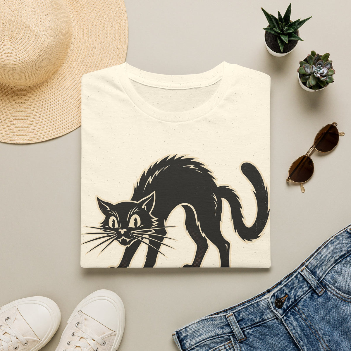 White crew-neck cat illustration T-shirt with black Halloween cat graphic, front view.