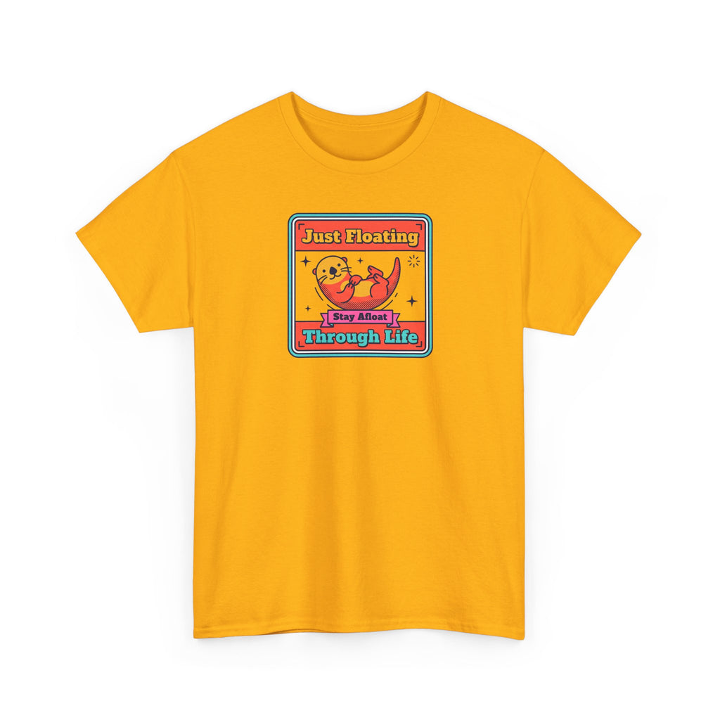 Orange otter graphic T-shirt with “Just Floating Through Life” front print