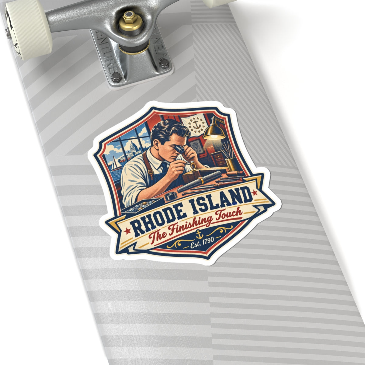 Rhode Island sticker on a gray notebook, nautical badge with sailor and “The Finishing Touch”
