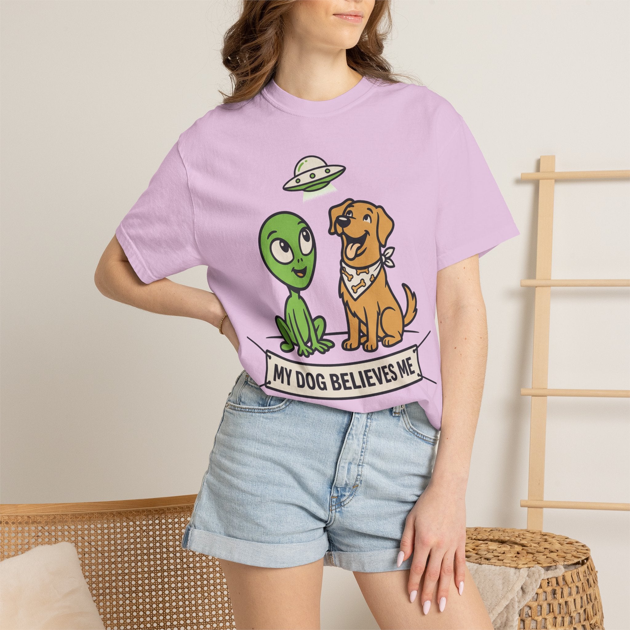 Lilac T-shirt with alien and dog cartoon graphic and small slogan banner