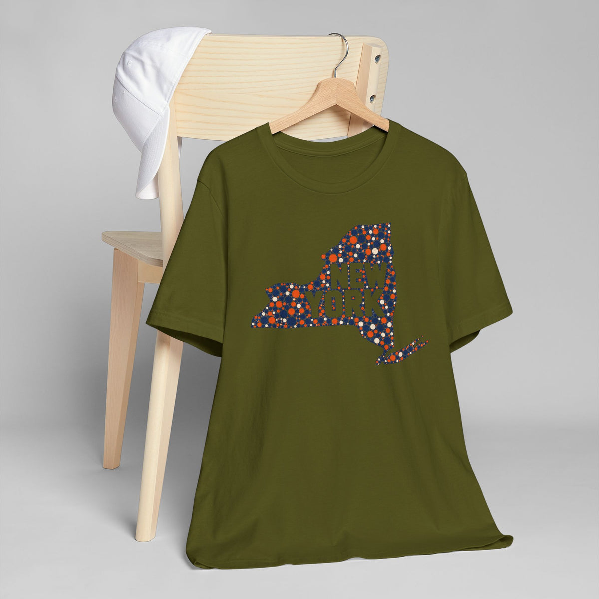 Olive green short-sleeve T-shirt with colorful New York outline graphic
