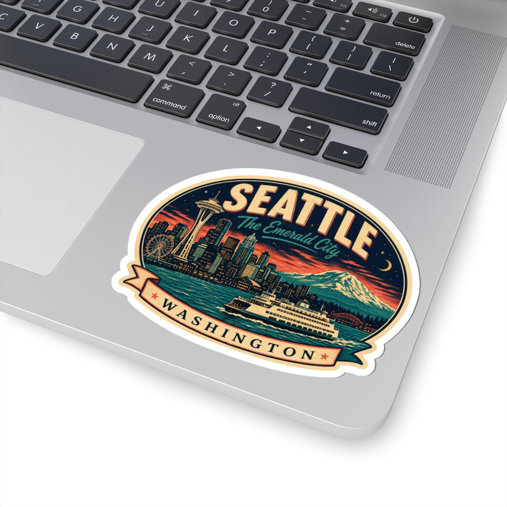Seattle luggage tag sticker on a laptop surface, oval badge with city skyline and Mount Rainier