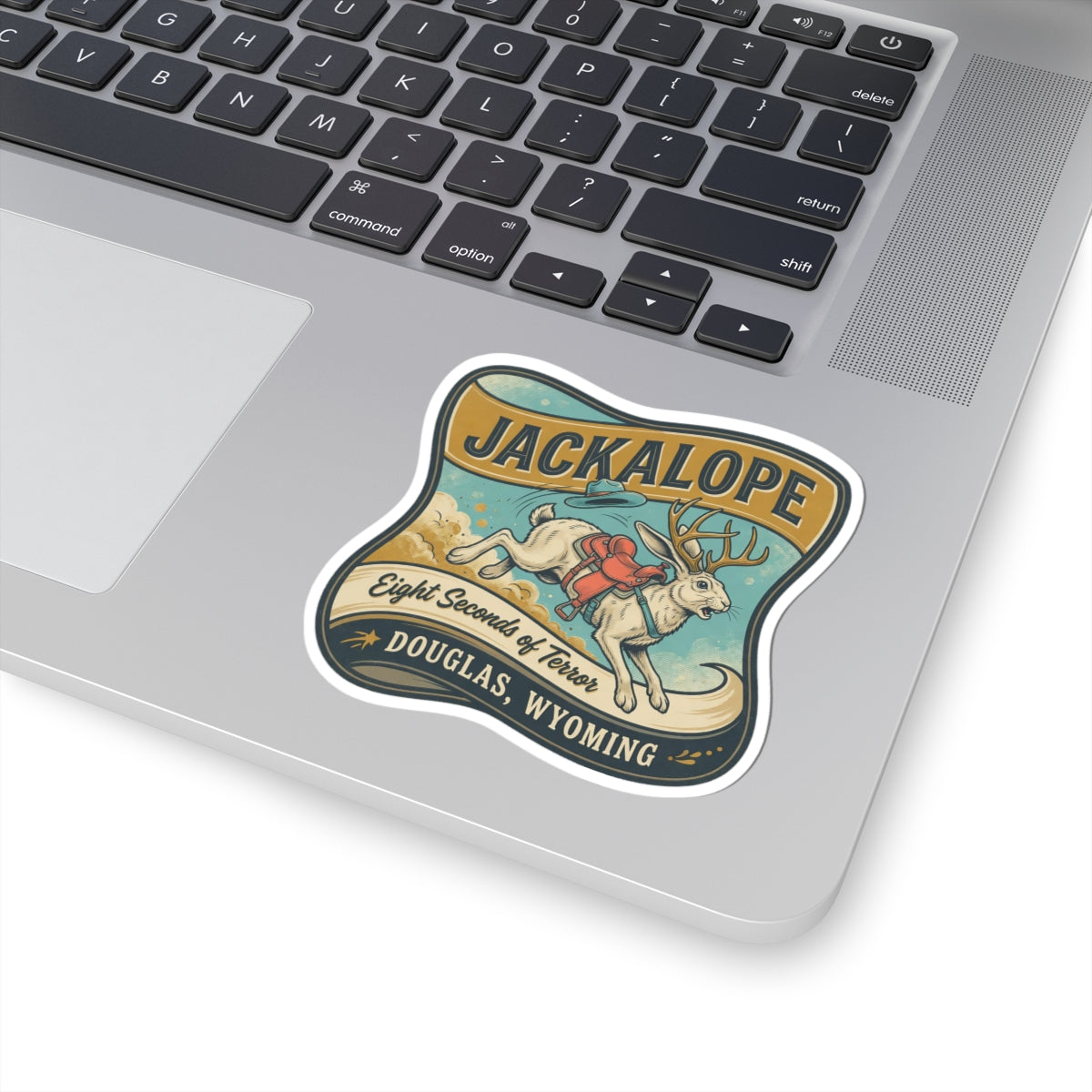 Jackalope sticker with “JACKALOPE” title and “DOUGLAS, WYOMING” in dark print border