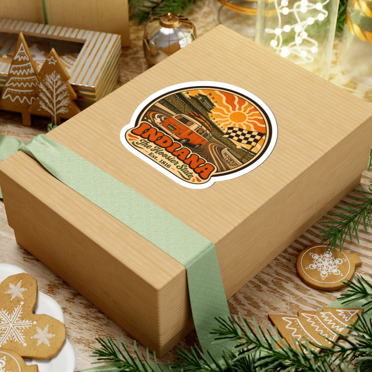 Round racing van sticker on wrapped gift box with checkered flag, sun rays, and Indiana