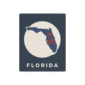 Blue metal art sign with Florida silhouette in white circle and 'FLORIDA' text