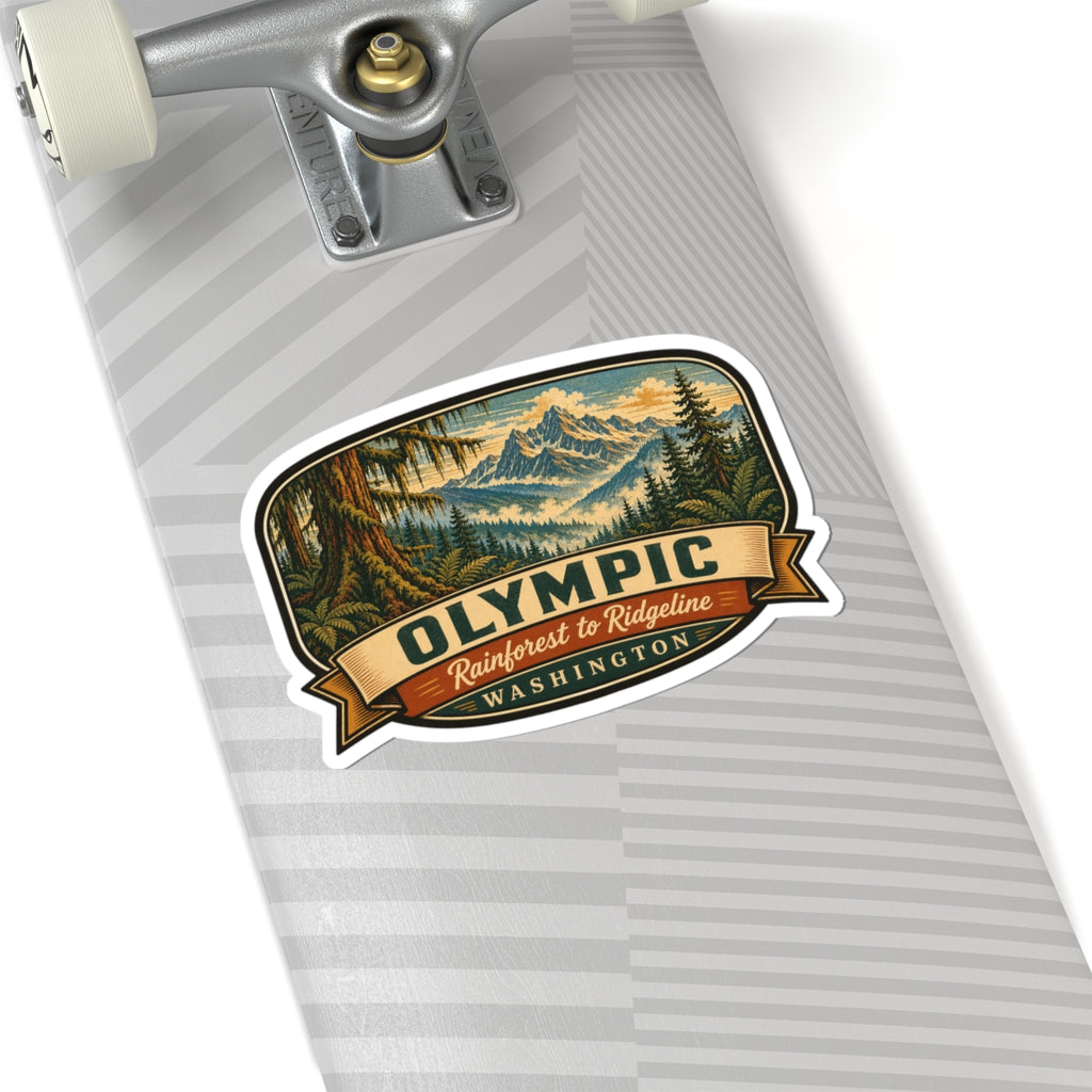 Olympic Washington travel sticker on travel bag, showing forest mountain graphic and ribbon text