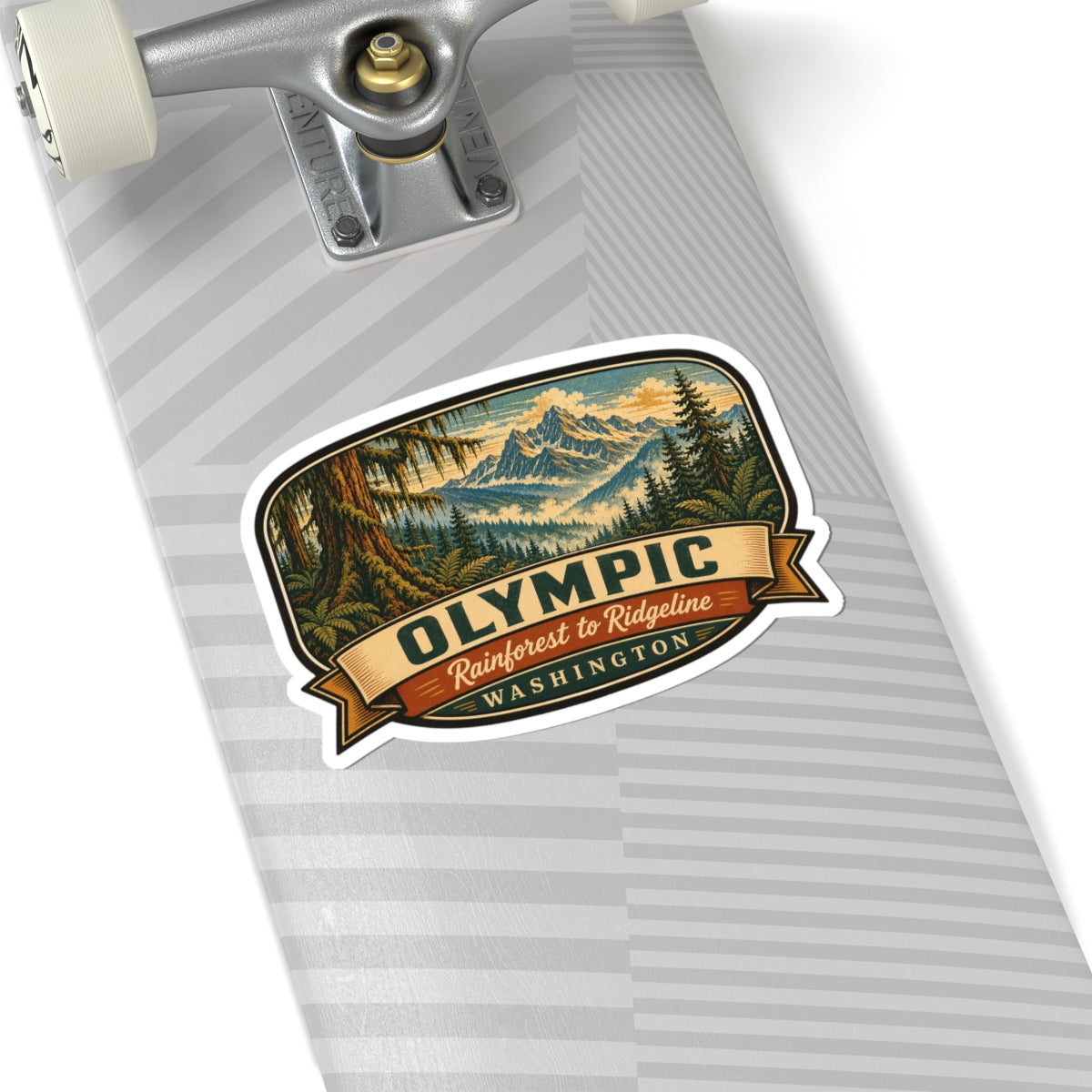 Olympic Washington travel sticker on travel bag, showing forest mountain graphic and ribbon text