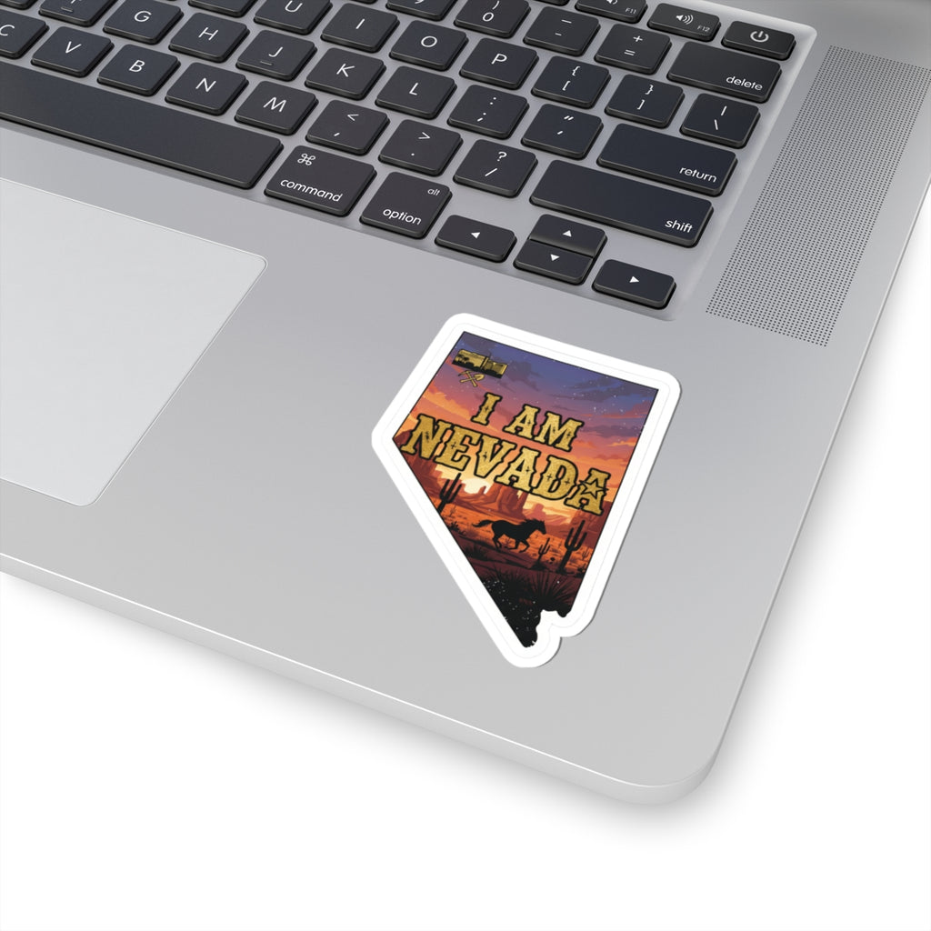 Kiss-cut Nevada sticker on laptop, “I AM NEVADA” western sunset text