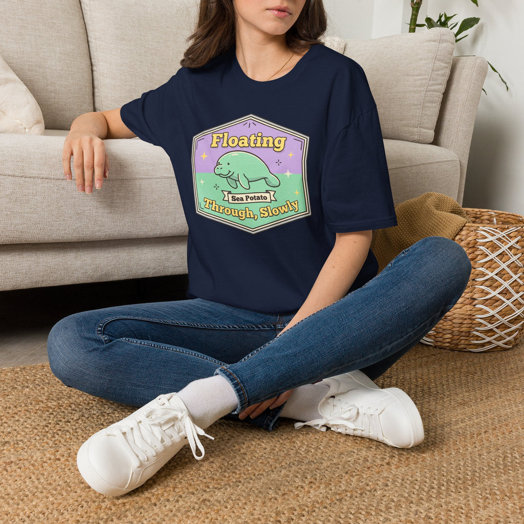 Navy T-shirt with floating manatee and 'Sea Potato' graphic, crew neck short sleeves