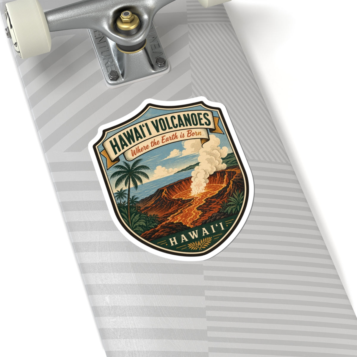 Shield-style die-cut sticker with Hawai'i Volcanoes text and lava eruption artwork