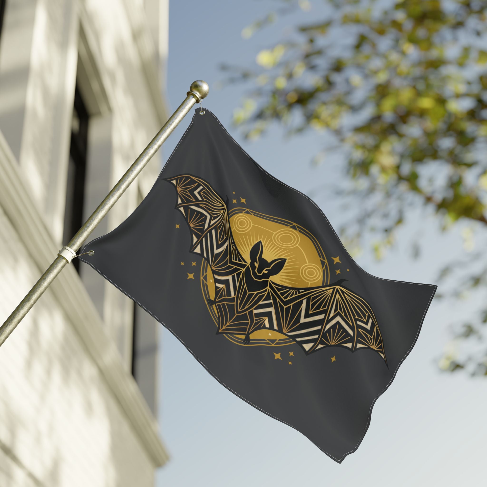 Bat banner flag on pole; dark fabric with gold art deco bat and moon design