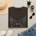 Dark brown graphic monster moth t-shirt with glowing red eyes and spread wings