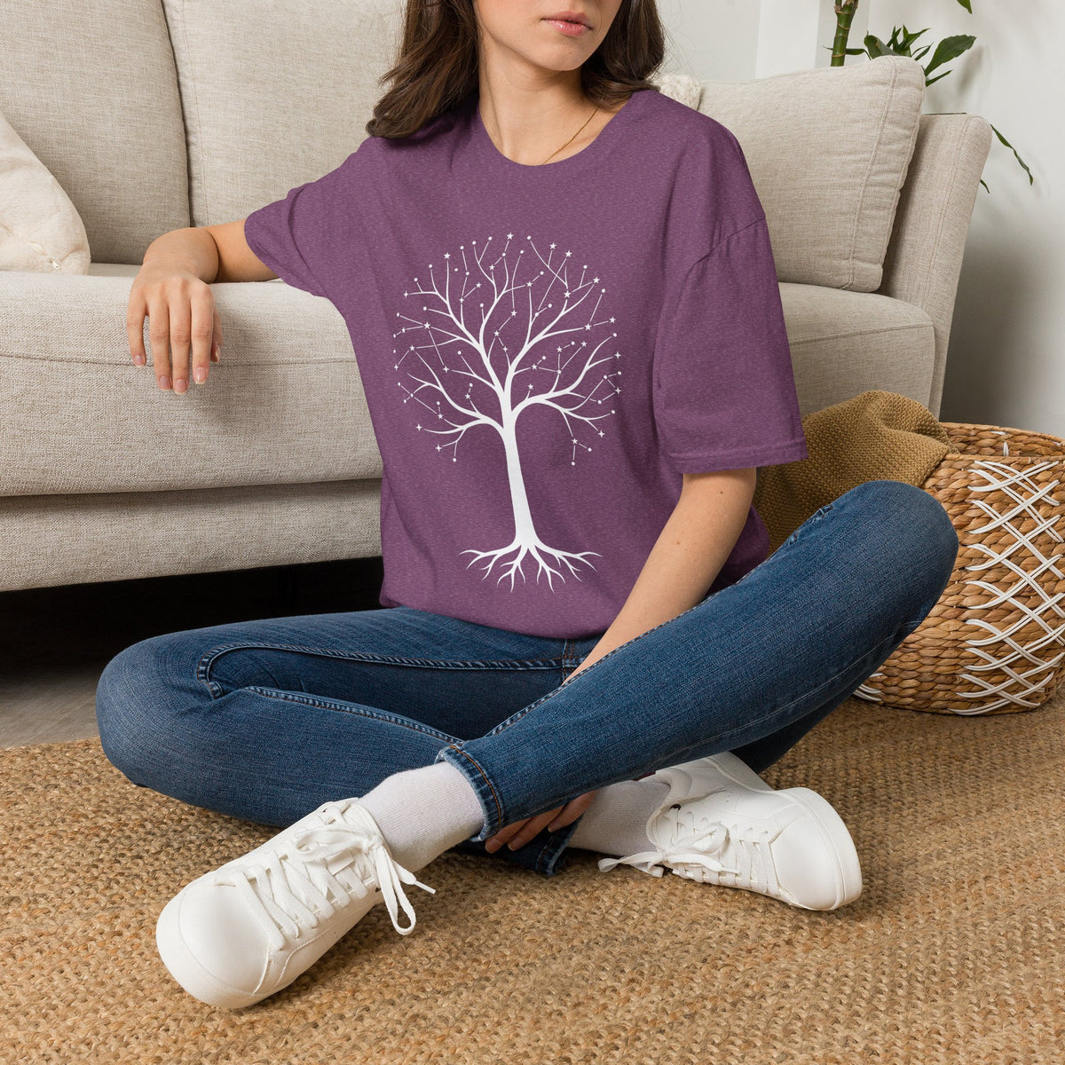 Purple t-shirt with constellation-style tree of life graphic on the front