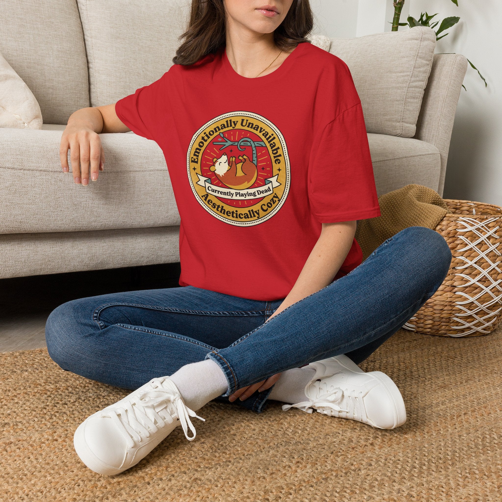 Red crew-neck T-shirt with circular sloth graphic on the chest