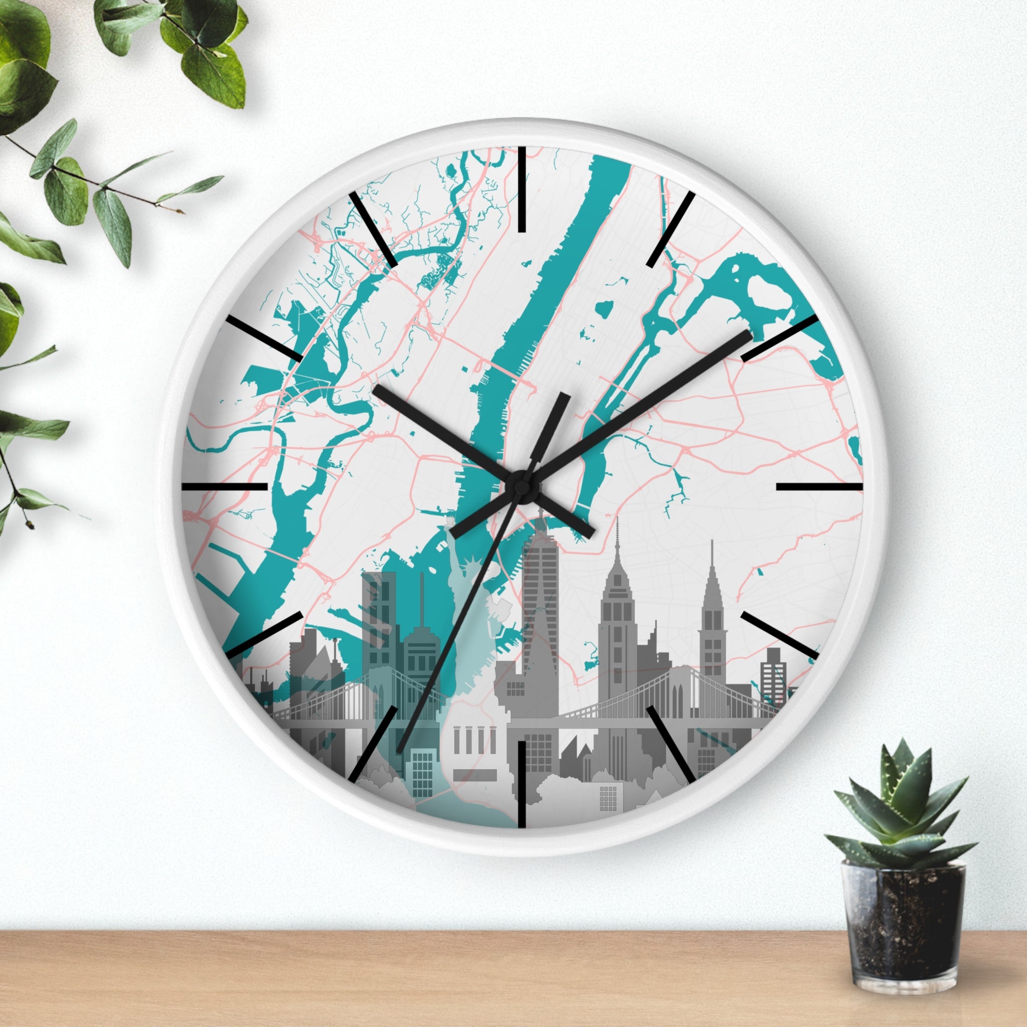 Teal river city map wall clock with black hands, white frame angled view