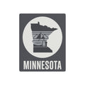 Minnesota metal silhouette wall sign, dark gray square with white circle and “MINNESOTA” lettering.