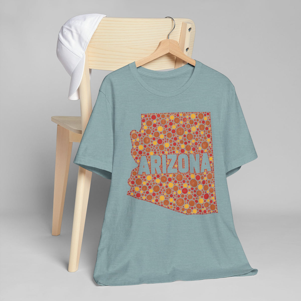 Teal crewneck short-sleeve T-shirt with orange Arizona graphic patch.