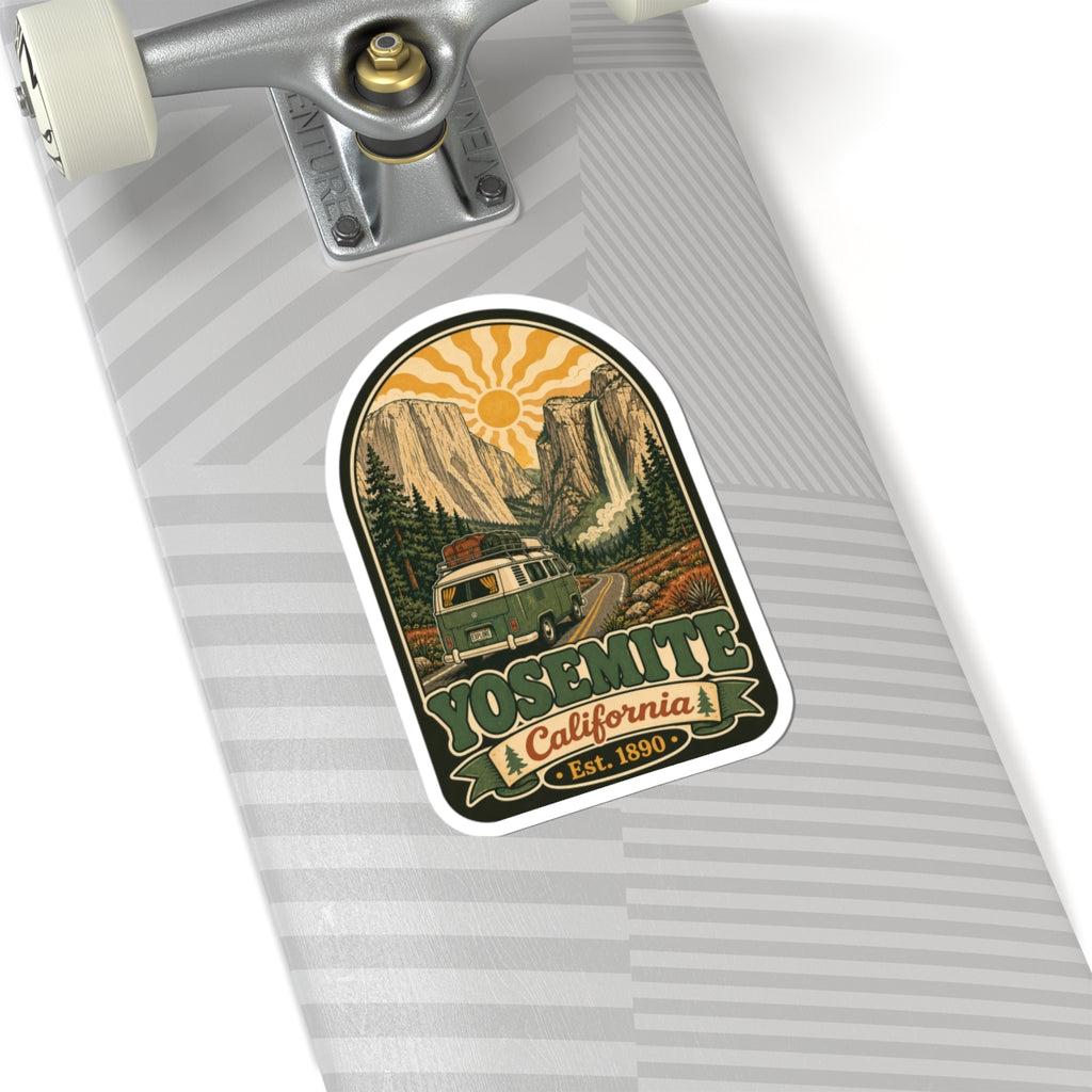 Arched camper van sticker on a suitcase surface, with “Yosemite” text and sun