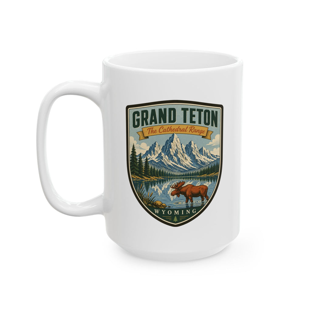 White ceramic mug with Grand Teton shield graphic and front handle
