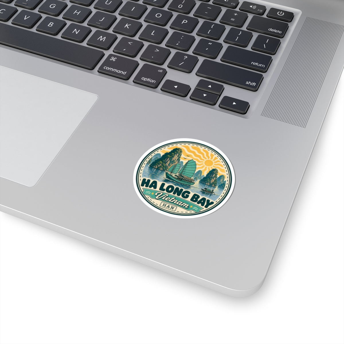 Ha Long Bay vintage travel sticker with boat and mountains, circular design